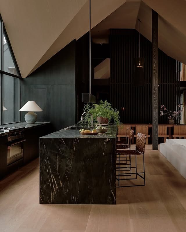 8. Elegant Classic Kitchen with Layered Lighting and Brass Details - luxury kitchen ideas