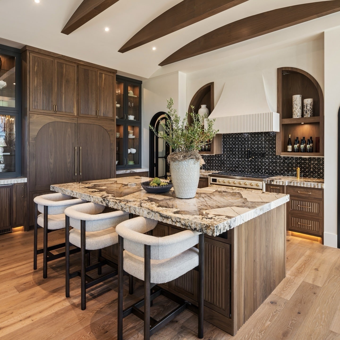 12. Rich Walnut Kitchen with Cream Marble Island - luxury kitchen ideas