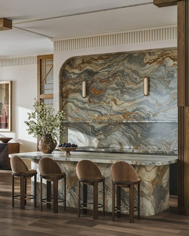 20. Artistic Stone Feature Kitchen with Neutral Wood Tones - luxury kitchen ideas