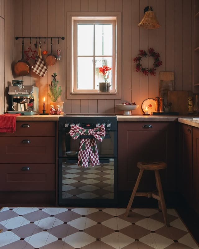 12. Moody Rustic Kitchen with Warm Wood and Festive Accents - christmas decor kitchen ideas