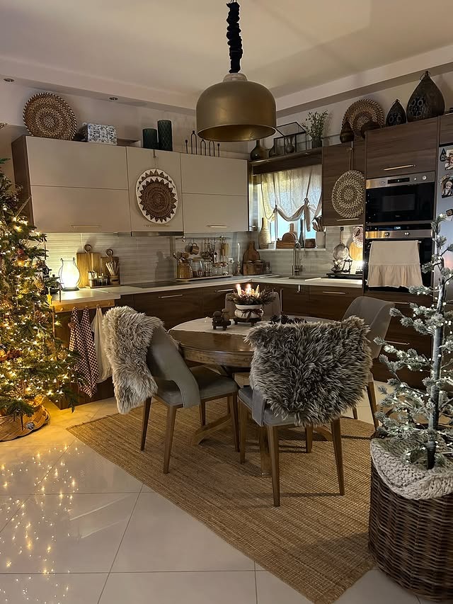 22. Warm Neutral Kitchen with Rustic Textures and Cozy Holiday Lighting - christmas decor kitchen ideas