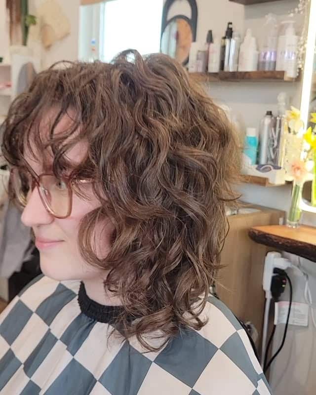 6. Soft Brown Curly Wolf Lob - Curly Wolf Haircut