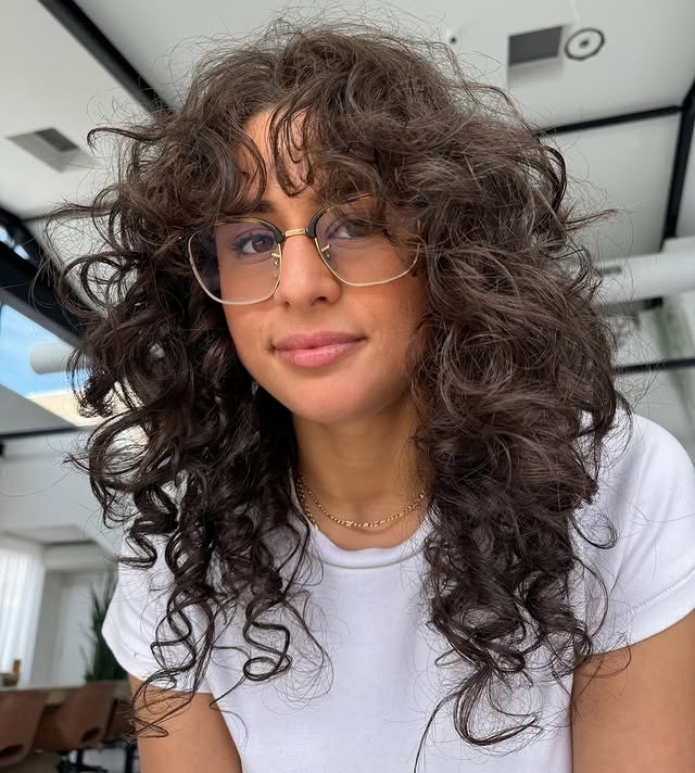 16. Voluminous Espresso Curly Wolf Shag with Curtain Fringe - Curly Wolf Haircut