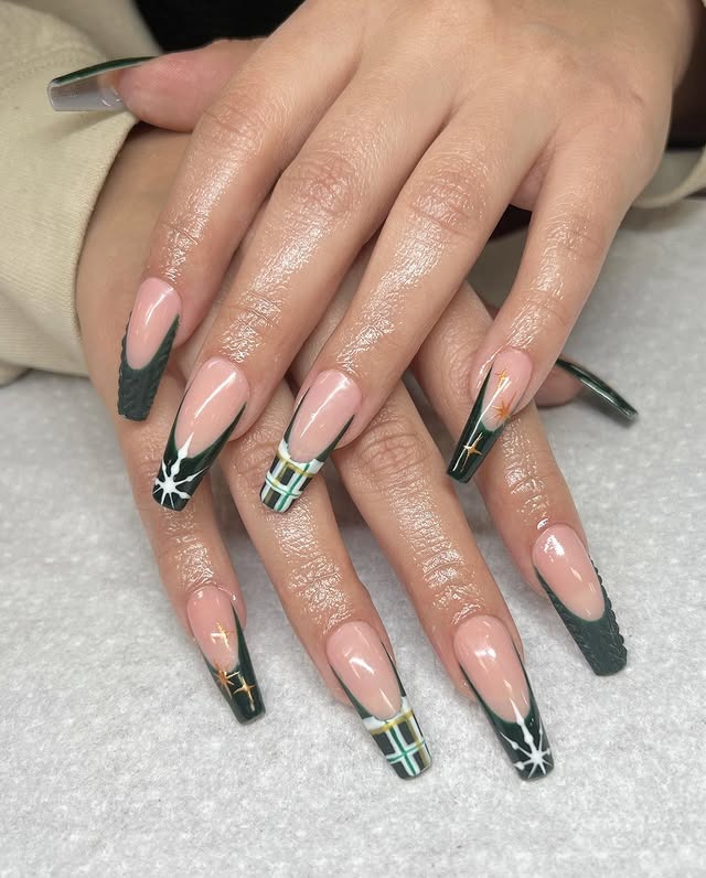 1. Emerald French Tip with Gold Star Accents - green christmas nail ideas