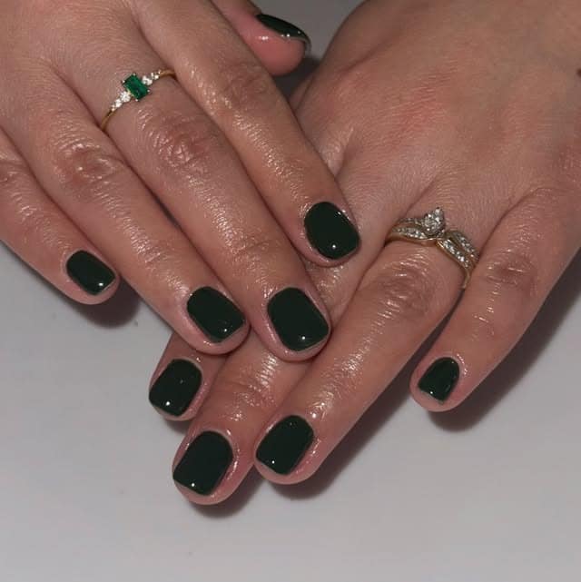 5. Classic Deep Green Short Gloss Nails - green christmas nail ideas