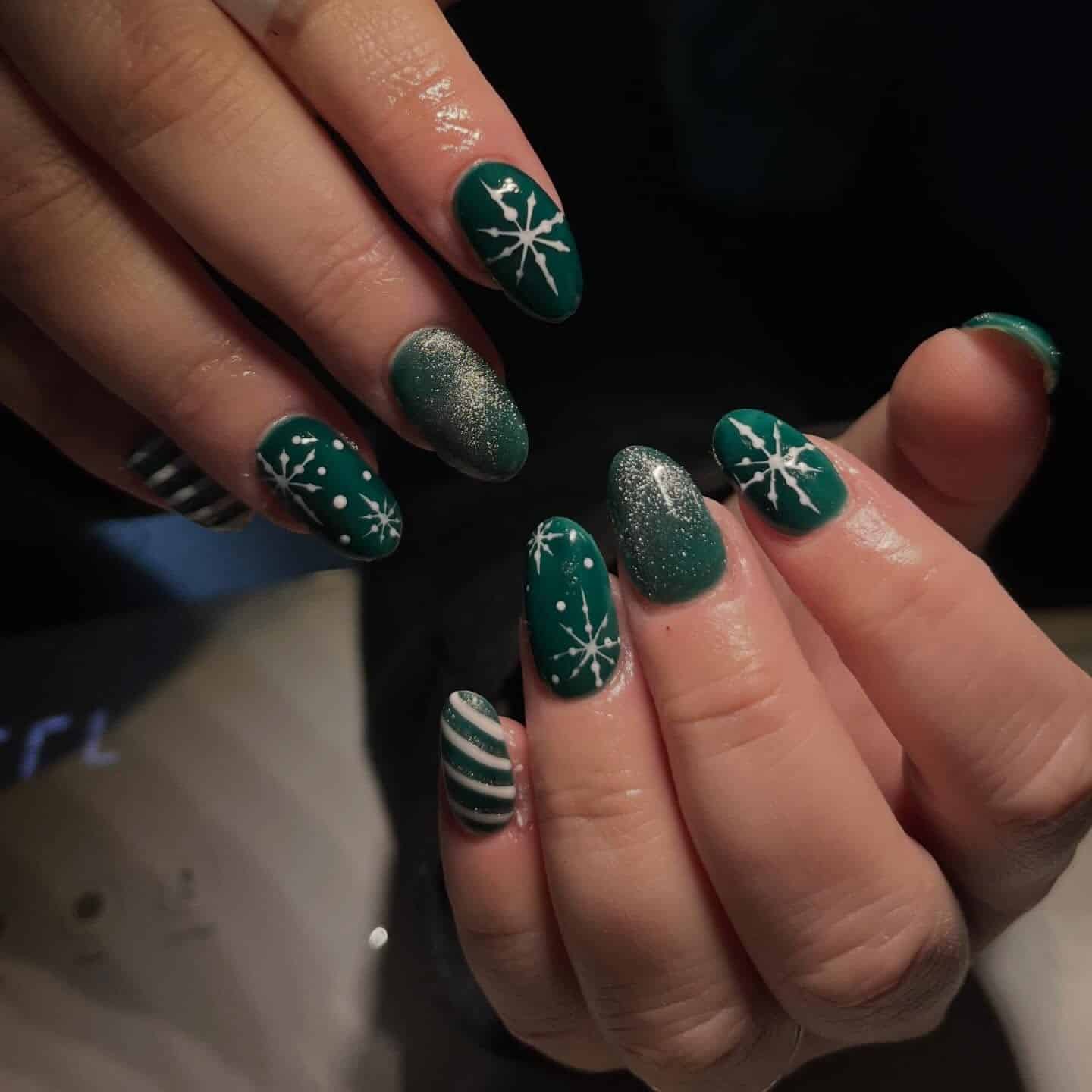 15. Matte and Shimmer Green Snowflake Nails - green christmas nail ideas
