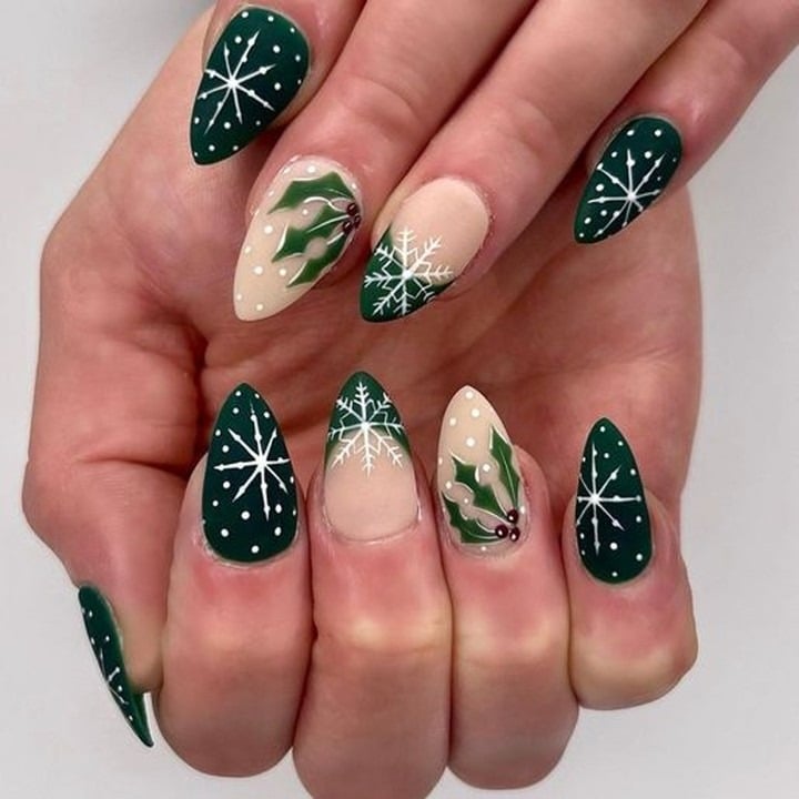 18. Forest Green and Nude Snowflake Almond Nails - green christmas nail ideas