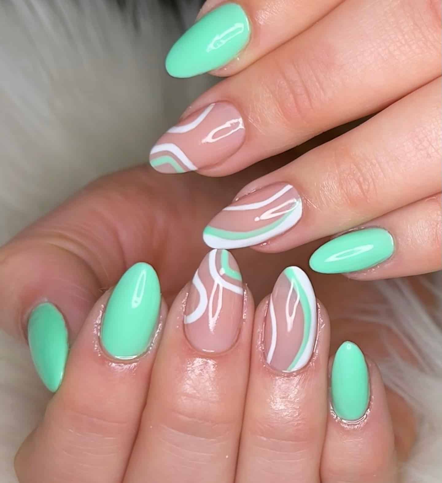 3. Mint Green Almond Nails with Minimal Line Art - lines nail ideas