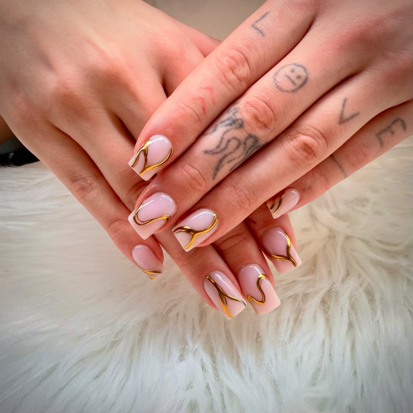 11. Short Nude Nails with Neon Pink and Orange Squiggle Lines - lines nail ideas
