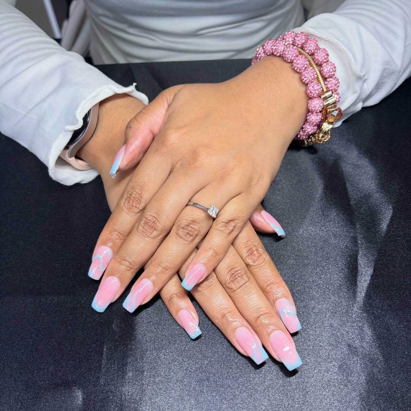 12. Almond Nude Nails with Multicolor Floral and Line Art Design - lines nail ideas