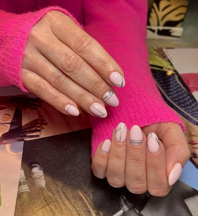 20. Almond Nude Nails with Minimal Blue Wavy Line Design - lines nail ideas