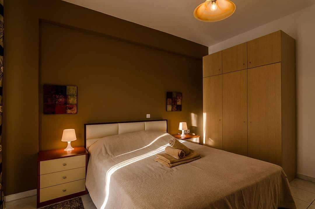 7. Golden Brown Bedroom with Subtle Retro Influence - brown bedroom ideas