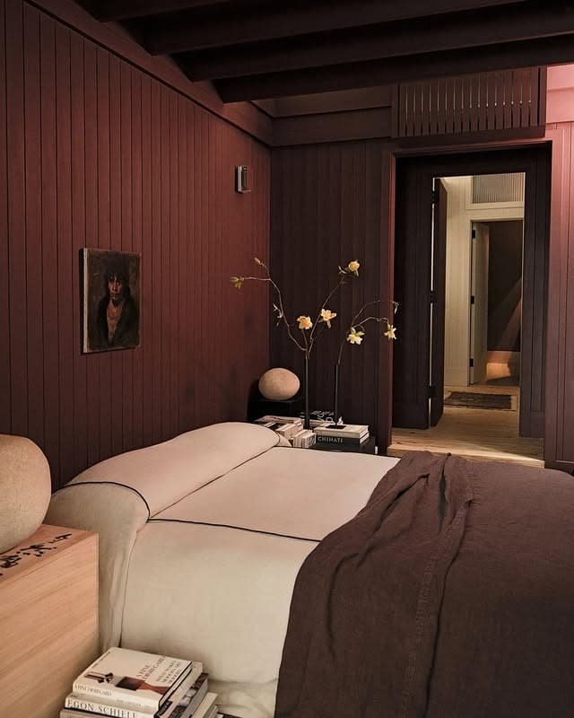 13. Deep Walnut Bedroom with Vertical Wood Paneling - brown bedroom ideas