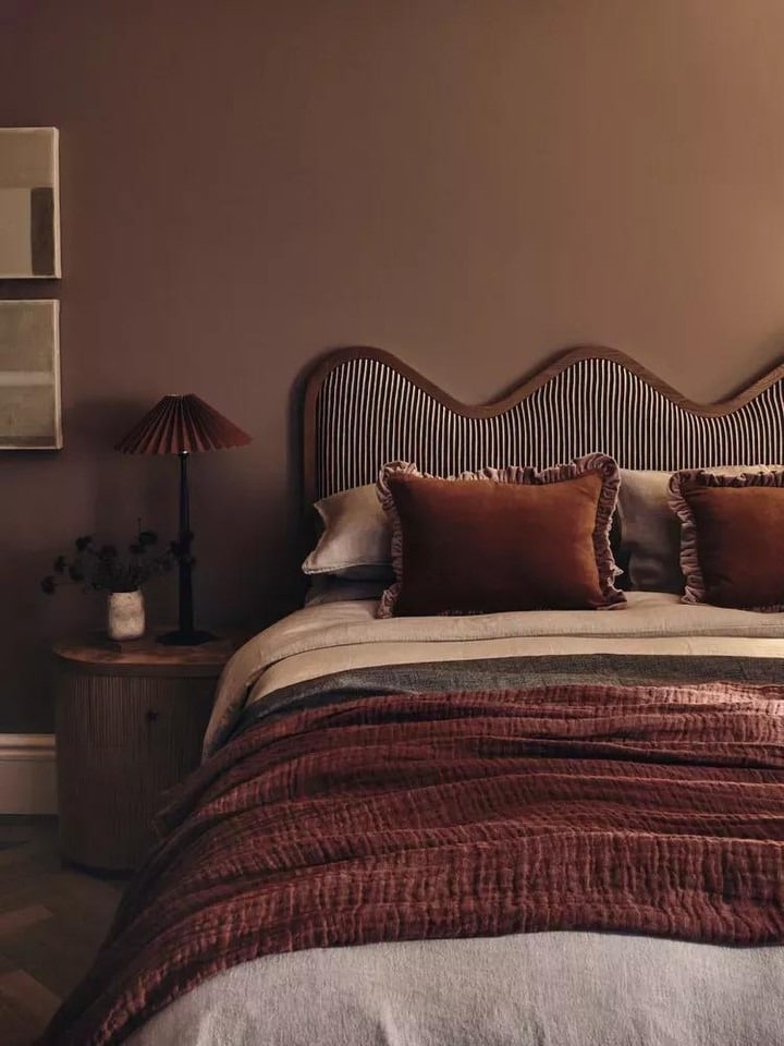 17. Muted Cocoa Bedroom with Sculpted Headboard Detail - brown bedroom ideas