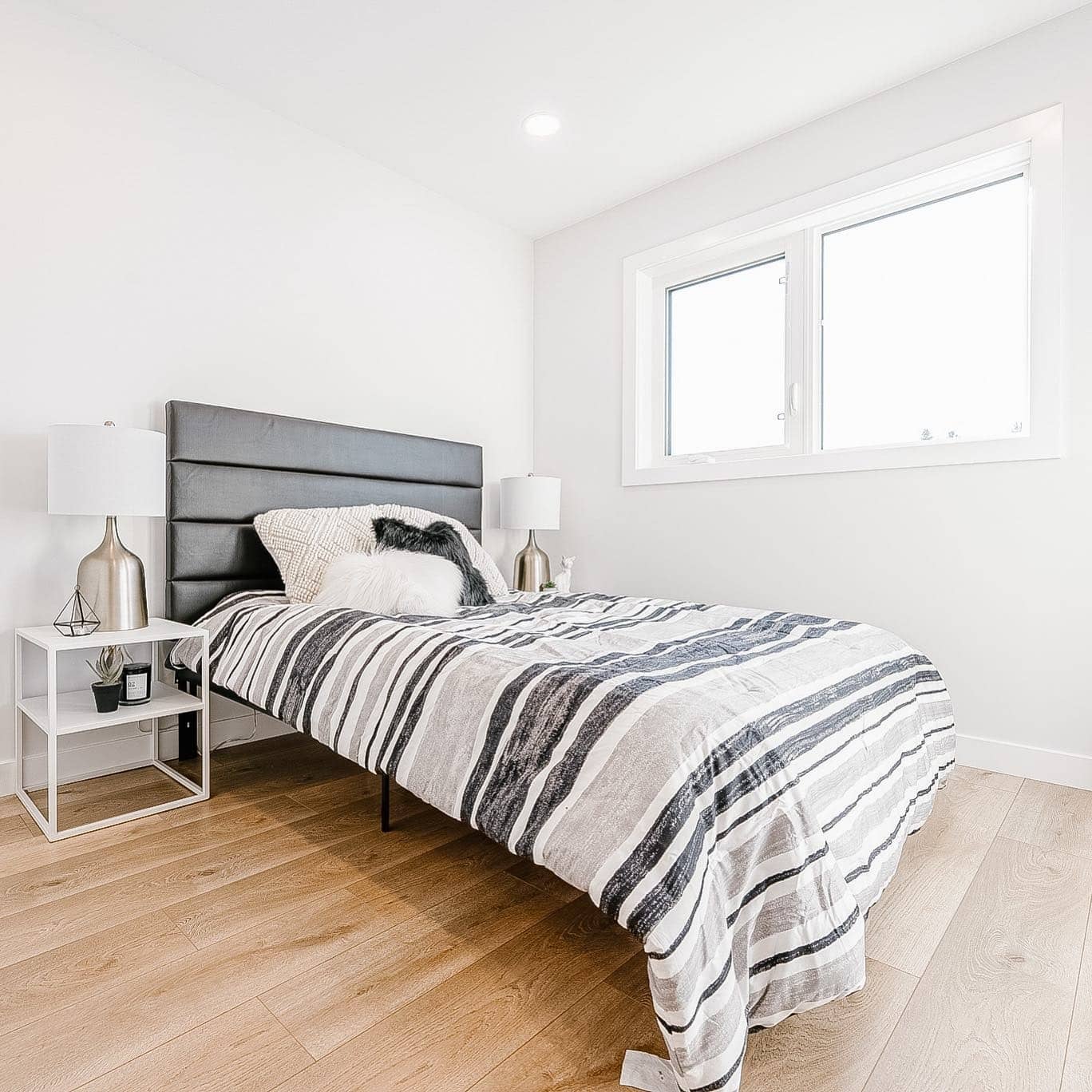 1. Minimal Black and White Bedroom with Clean Lines - simple bedroom ideas