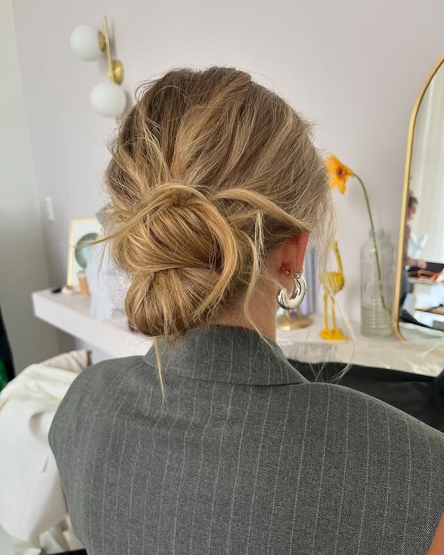 3. Loose Loop Low Bun with Warm Blonde Highlights - Low Messy Hair Bun