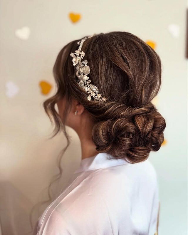 7. Low Textured Bun with Golden Brunette Dimension - Low Messy Hair Bun