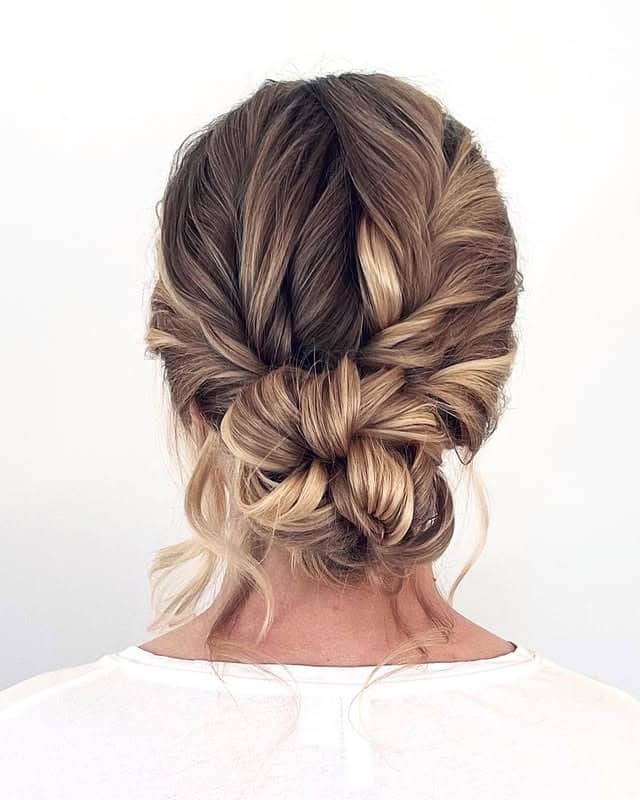 12. Braided Low Bun with Ash Blonde Balayage - Low Messy Hair Bun