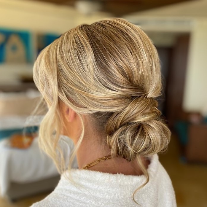 20. Twisted Low Bun with Golden Blonde Dimension - Low Messy Hair Bun