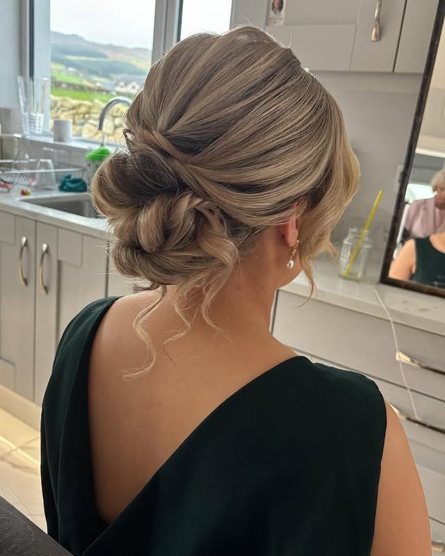 22. Twisted Low Bun with Cool Ash Blonde Dimension - Low Messy Hair Bun