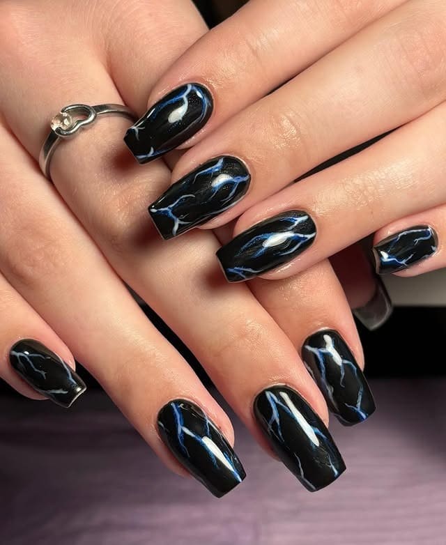 10. Black Marble Coffin Nails with Blue Veining - black nail ideas