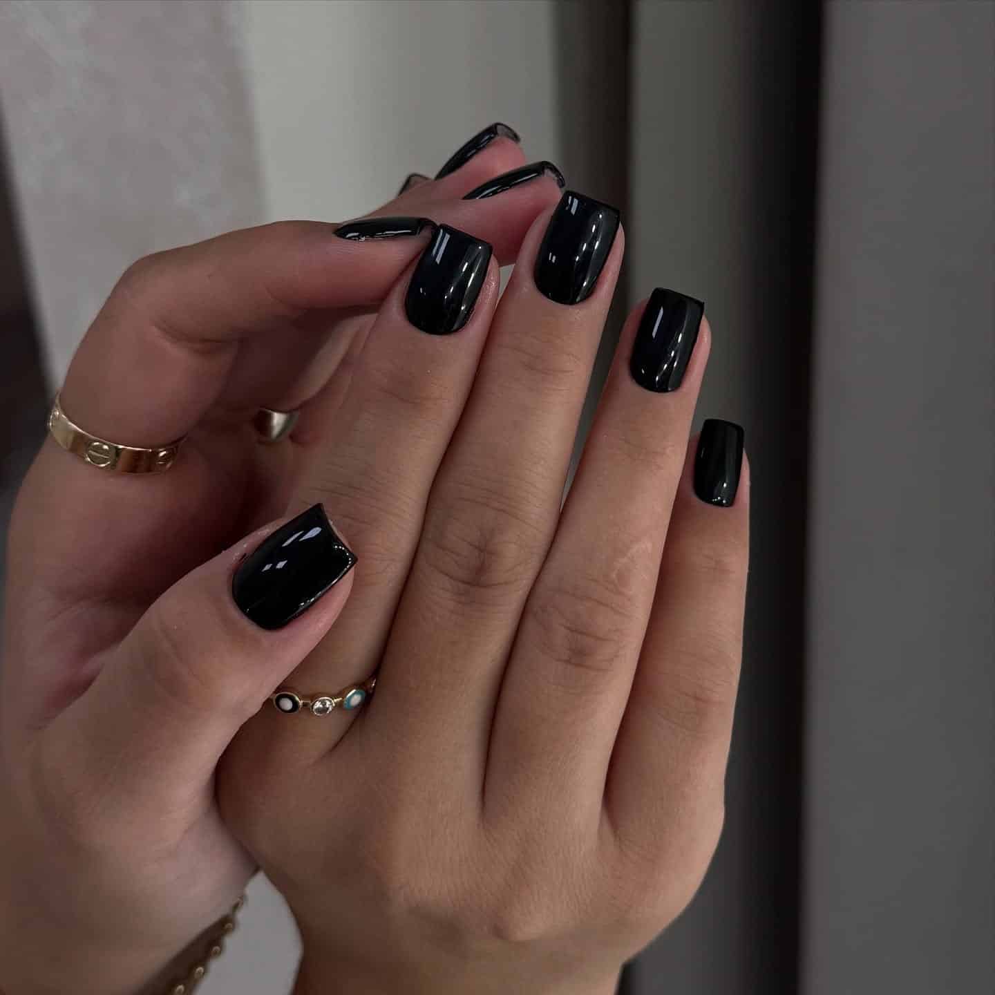 14. Short Glossy Black Square Nails - black nail ideas