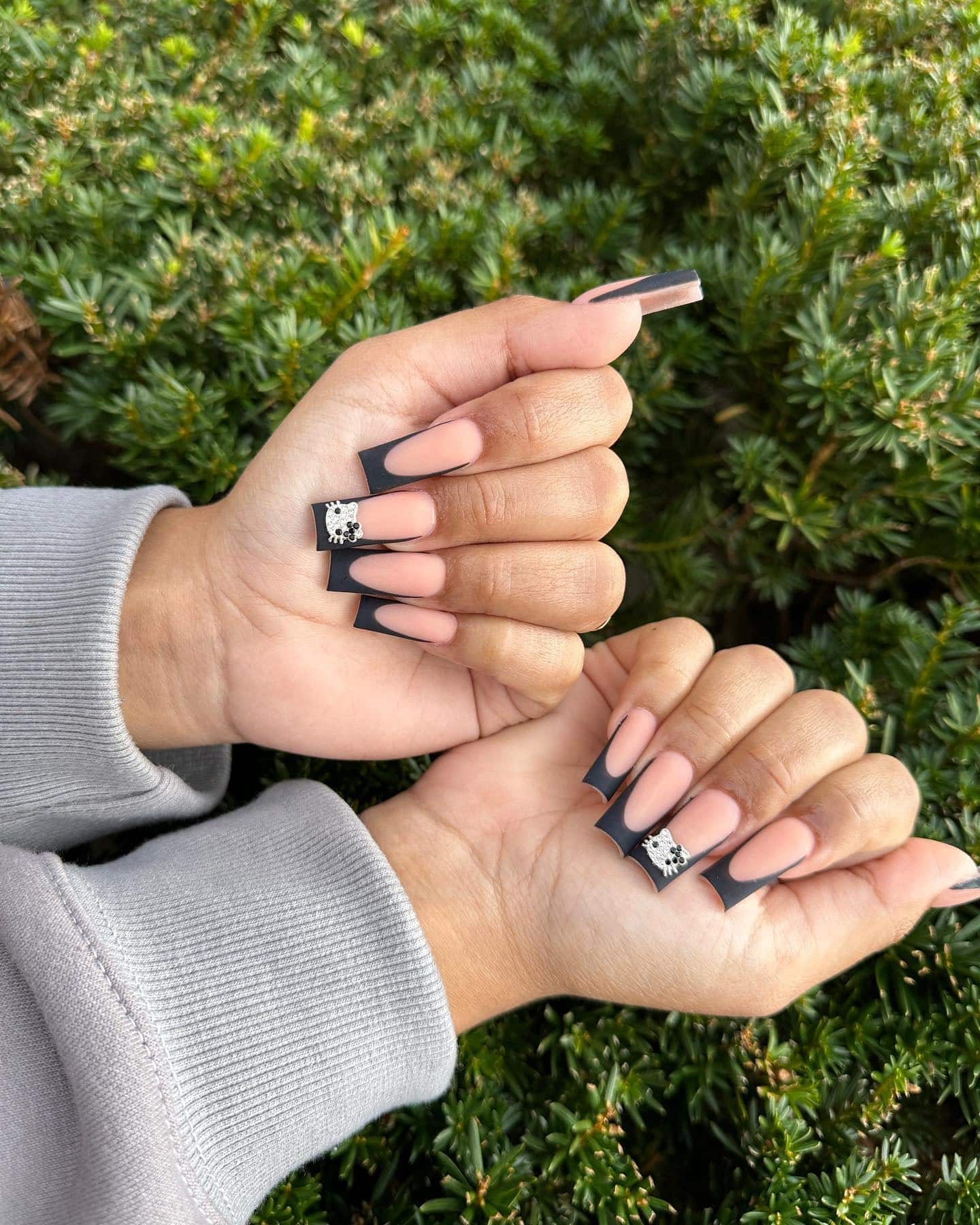 15. Matte Nude and Black Square French Nails with Rhinestones - black nail ideas