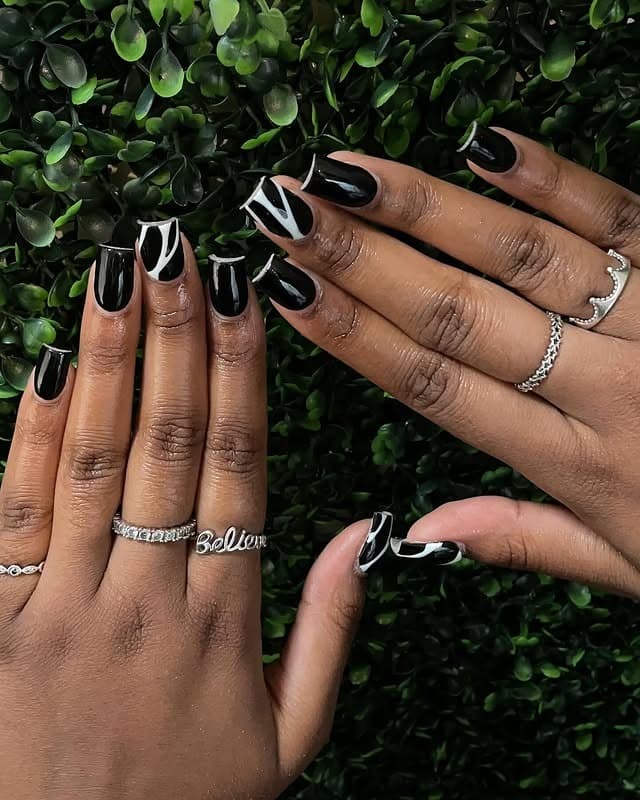16. Black and White Swirl Accent Square Nails - black nail ideas
