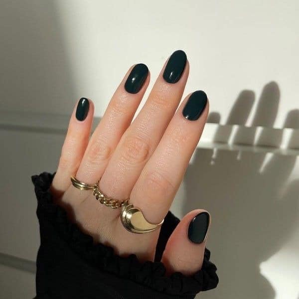 19. Deep Black Oval Nails - black nail ideas