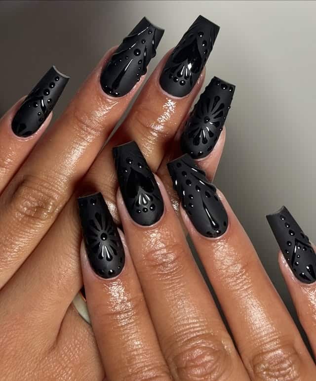 21. Matte and Gloss Black Embossed Coffin Nails - black nail ideas