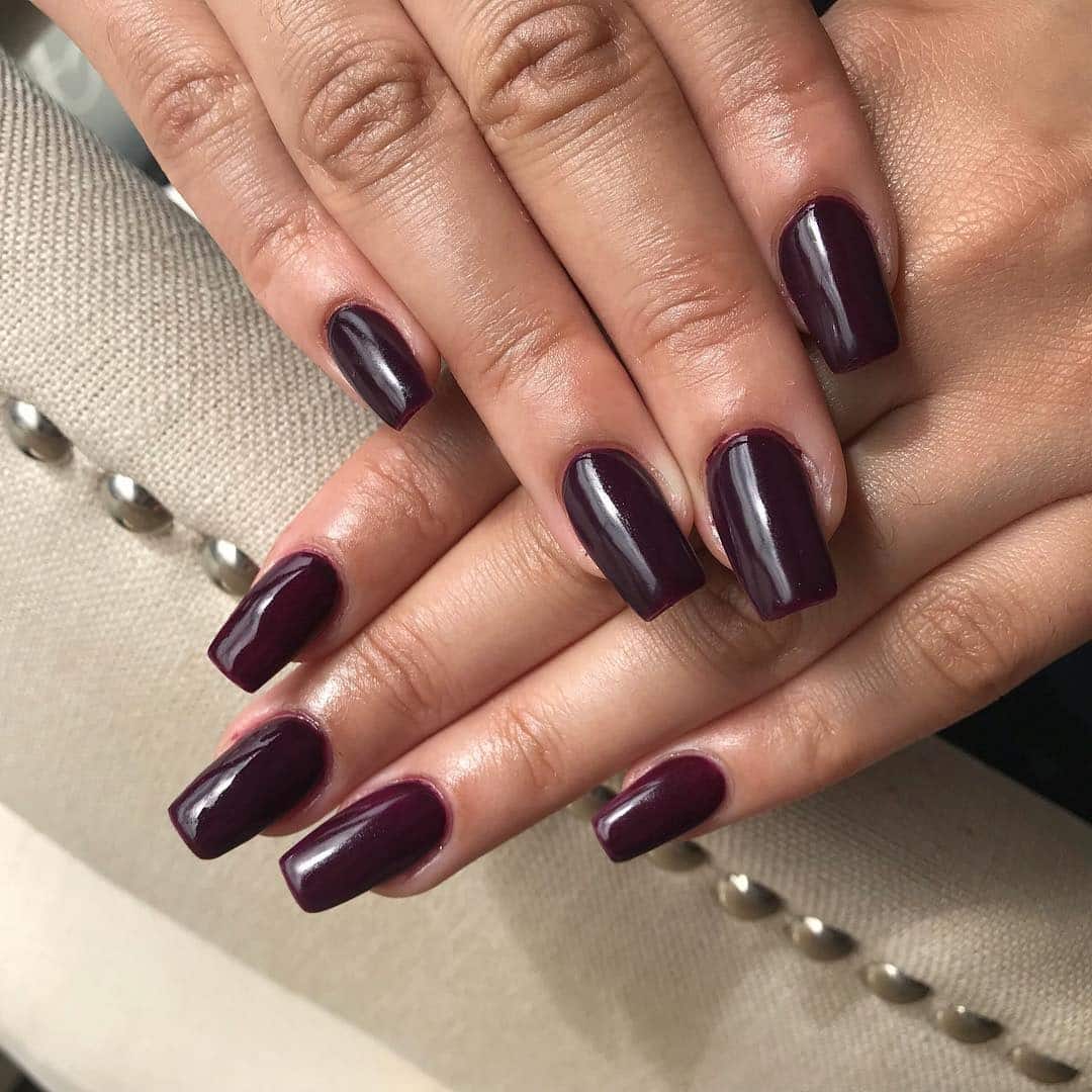 1. Deep Burgundy Gloss Coffin Nails - dark coffin nail ideas
