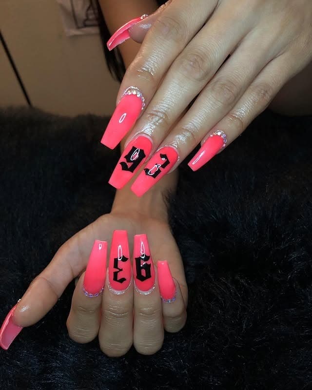 5. Neon Pink Coffin Nails with Graphic Letter Design - dark coffin nail ideas
