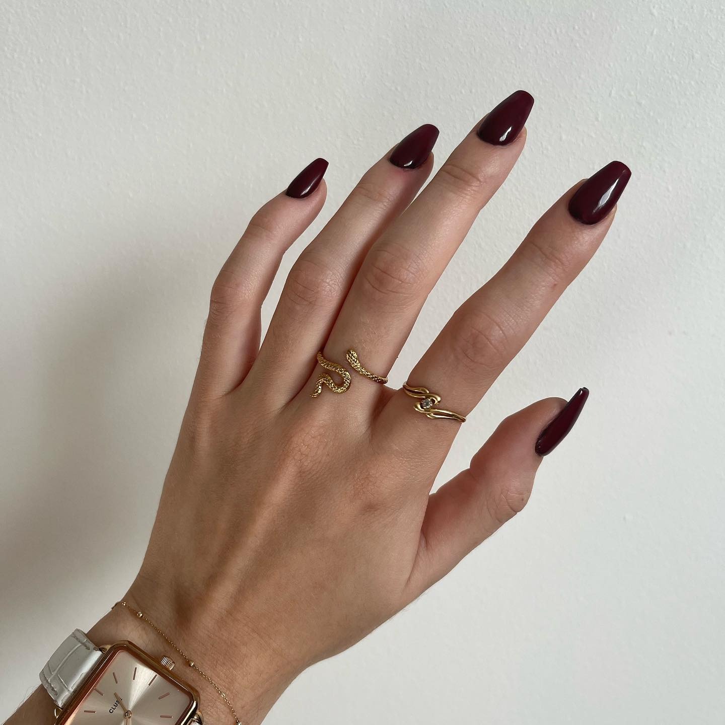 8. Classic Deep Red Almond Nails - dark coffin nail ideas