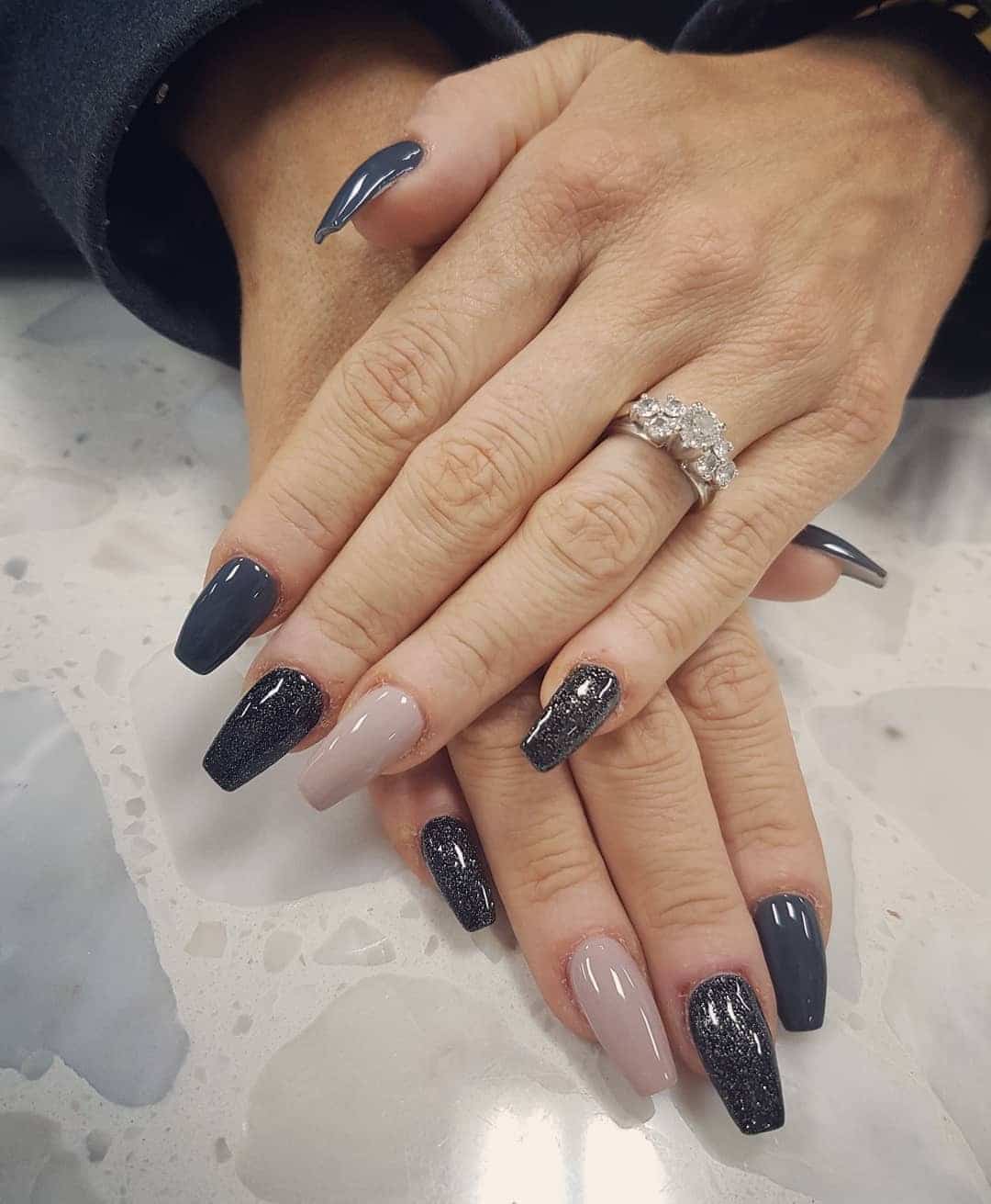 14. Charcoal and Nude Coffin Nails with Glitter Accent - dark coffin nail ideas