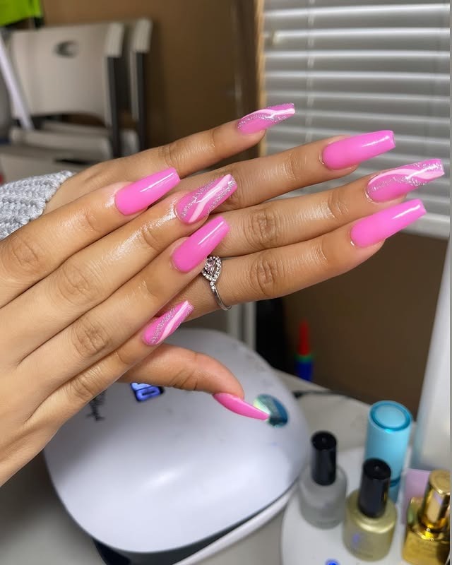 15. Bright Pink Coffin Nails with Glitter Swirl Design - dark coffin nail ideas