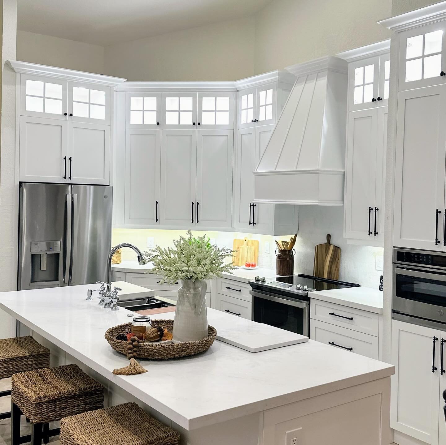 1. Classic White Shaker Kitchen with Bright Countertops - white countertop kitchen ideas