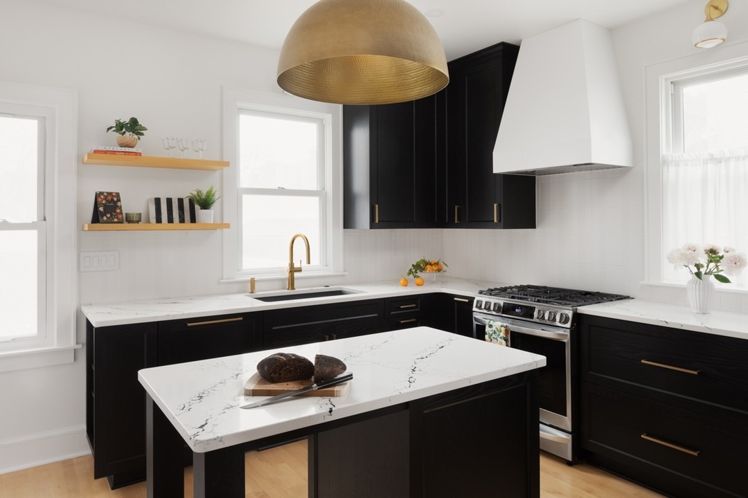 8. Bold Contrast Kitchen with White Countertops and Dark Cabinetry - white countertop kitchen ideas