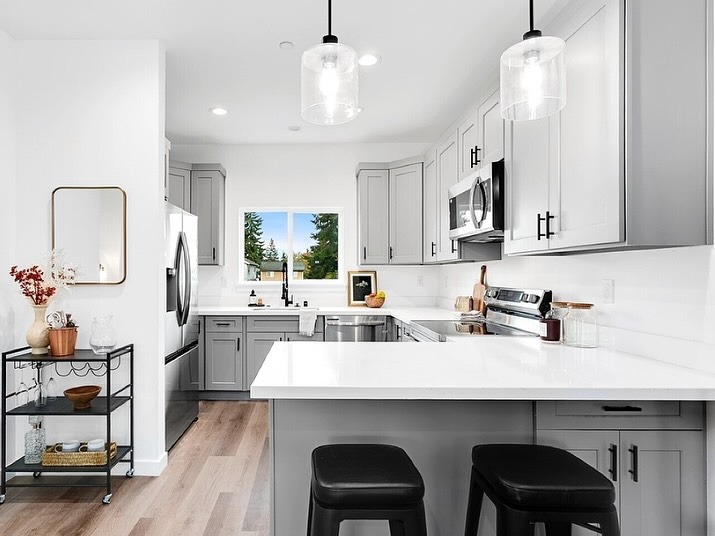 10. Light Gray and White Countertop Kitchen with Open Layout - white countertop kitchen ideas