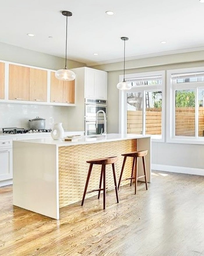 22. Soft White Countertop Kitchen with Natural Wood and Woven Texture - white countertop kitchen ideas