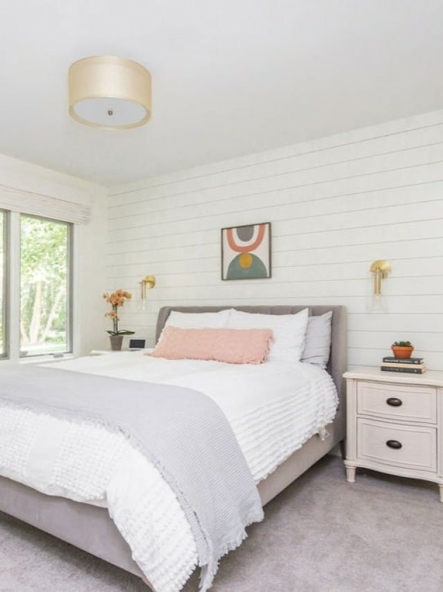 10. White Shiplap Bedroom with Soft Blush Accents - white wall bedroom ideas