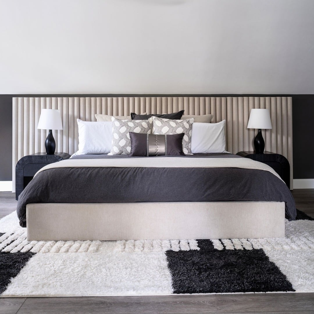 15. Black and White Contrast Bedroom with Textured Headboard - white wall bedroom ideas