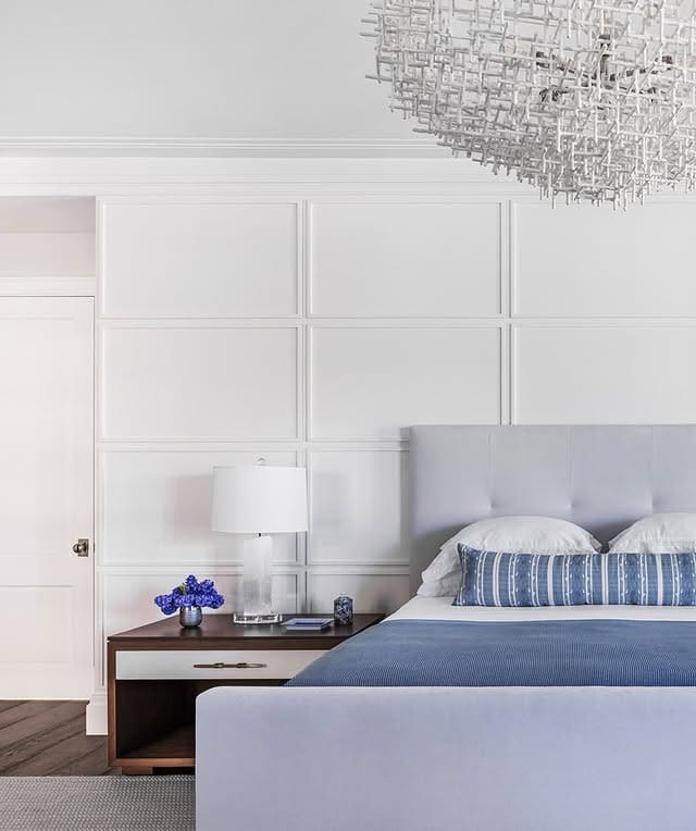 16. White Grid Wall with Blue Bedding and Dark Wood Details - white wall bedroom ideas