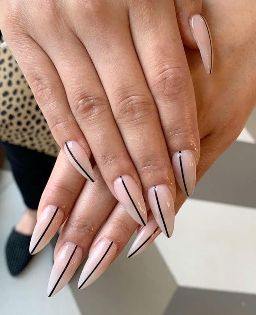 3. Nude Stiletto Nails with Fine Line Accents - minimalistic nail ideas