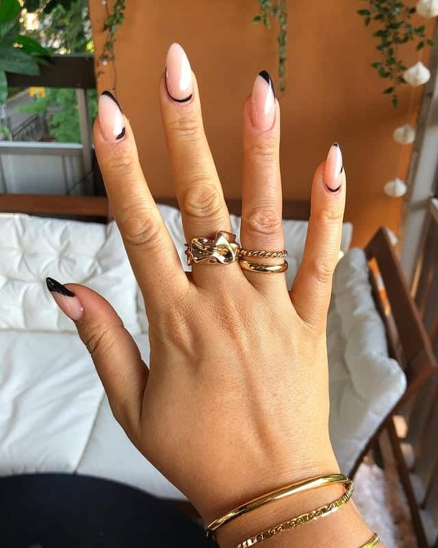14. Nude Almond Nails with Abstract Black Curve Tips - minimalistic nail ideas