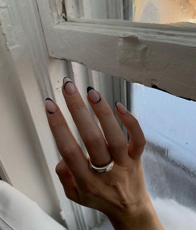 19. Soft Pink Almond Nails with Thin Black French Tips - minimalistic nail ideas