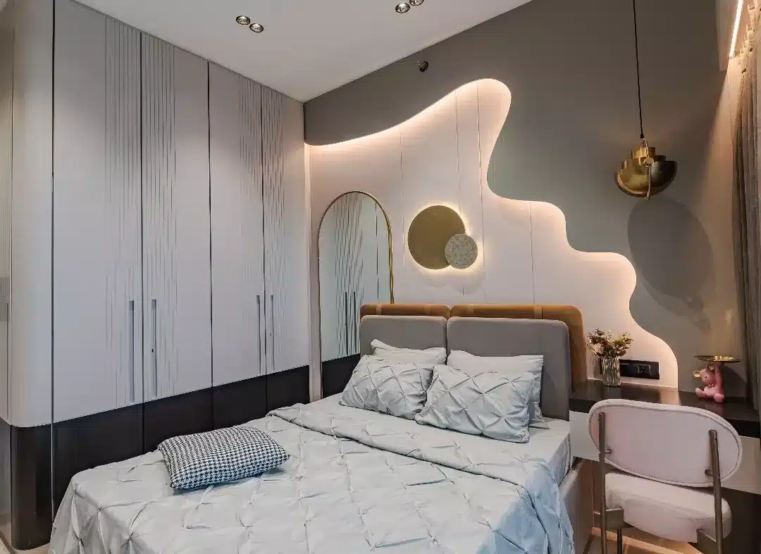 3. Sculptural Wall Bedroom with Artistic Mirror Feature - bedroom ideas with mirror