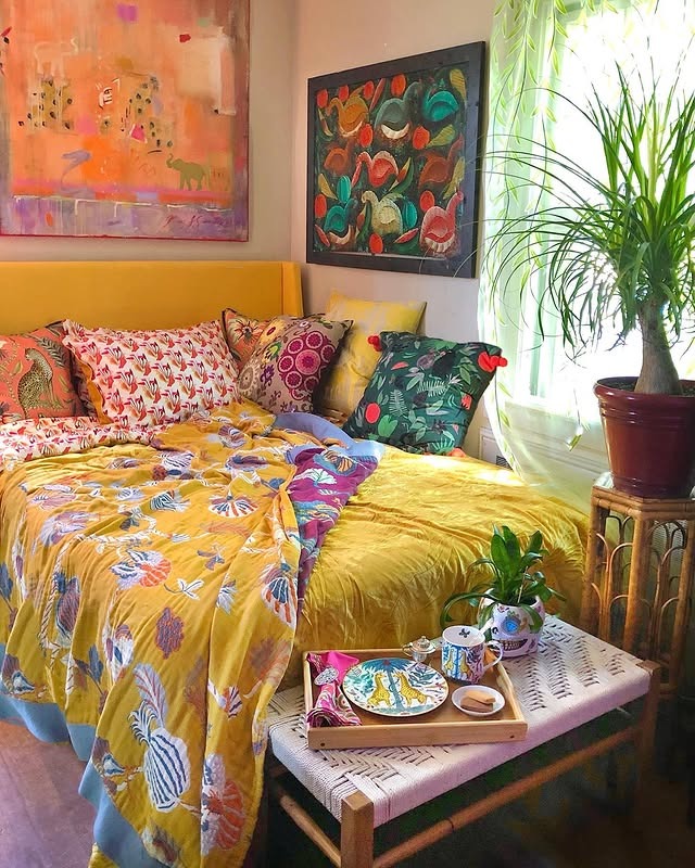 1. Bold Eclectic Yellow Bedroom with Layered Patterns - small guest bedroom ideas