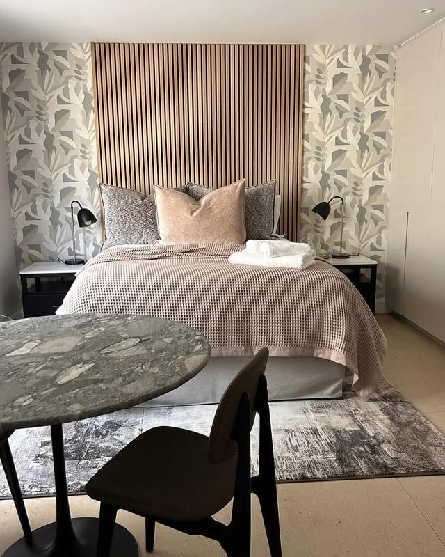 2. Soft Neutral Modern Bedroom with Wood Panel Accent - small guest bedroom ideas