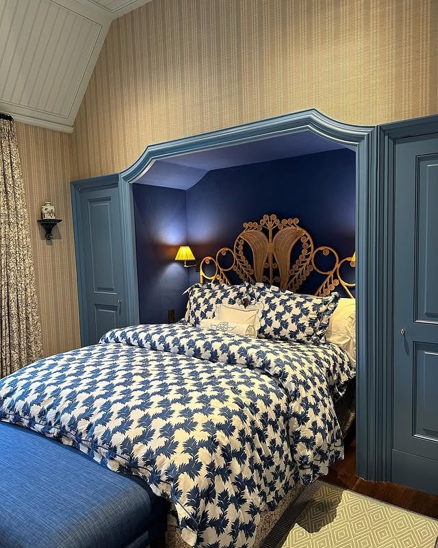 3. Classic Blue Alcove Bedroom with Statement Headboard - small guest bedroom ideas