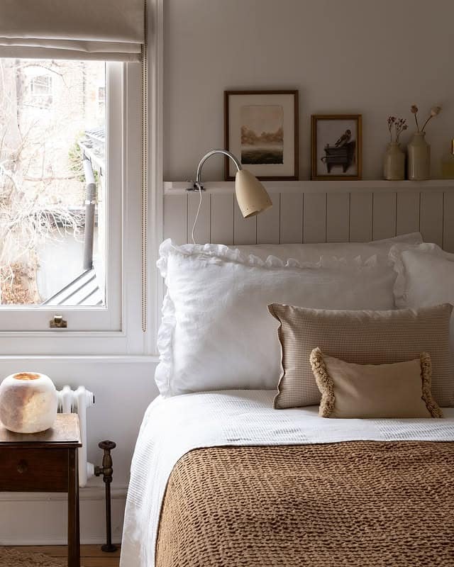 21. Soft Beige and White Bedroom with Classic Panel Detail - small guest bedroom ideas